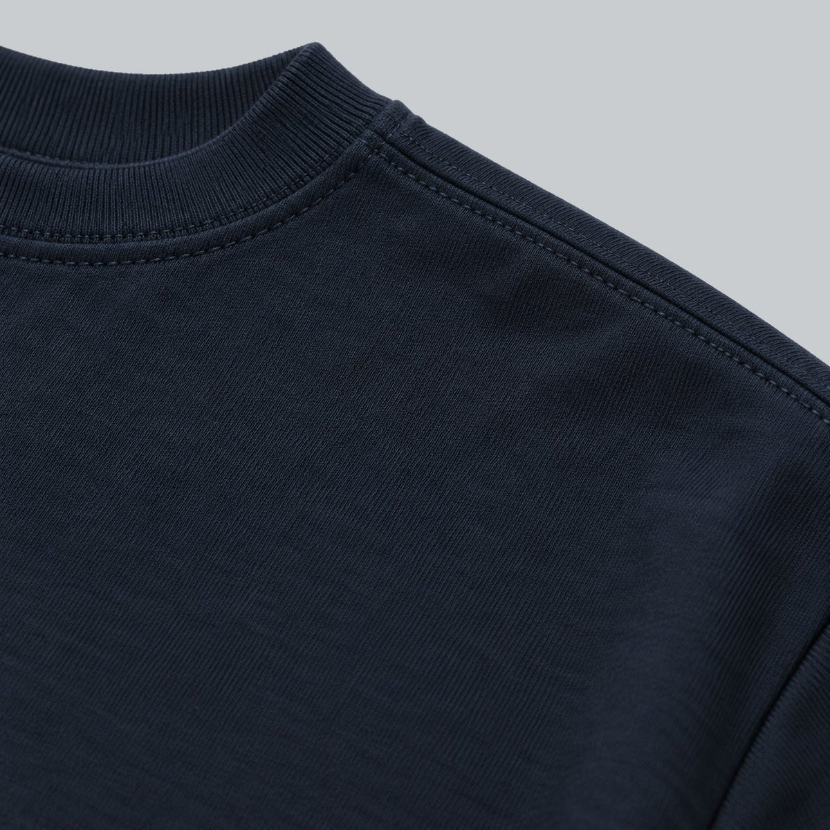Premium Unisex Tech Tool Core T-Shirt, back construction macro showing crew neckline, shoulder stitching and cotton jersey | Color: Midnight Navy