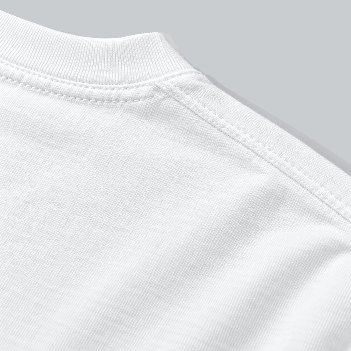 Premium Unisex Tech Tool Core T-Shirt, back construction macro showing crew neckline, shoulder stitching and cotton jersey | Color: White