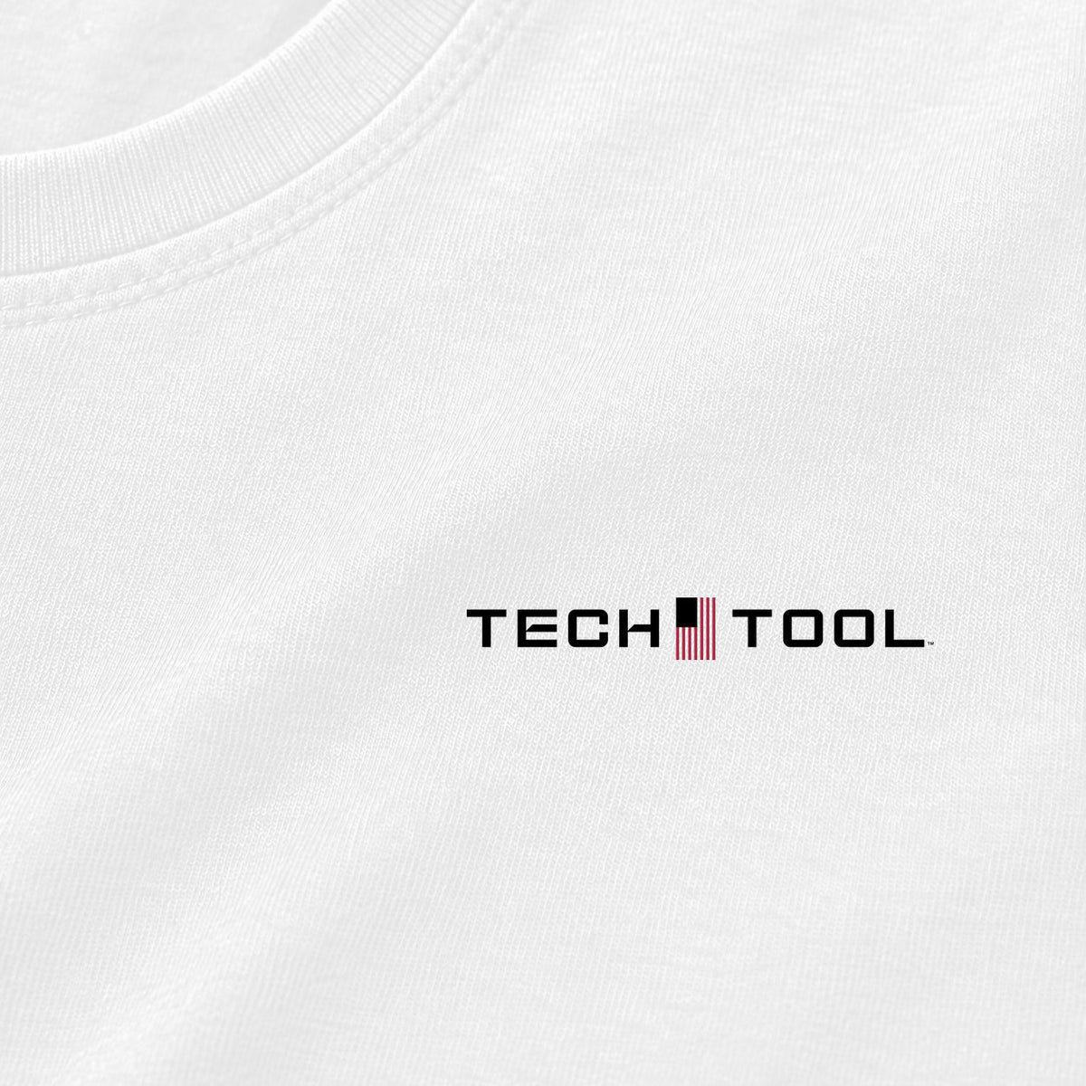 Tech Tool Core T-Shirt, level left-chest logo close-up showing cotton jersey and neckline | Color: White