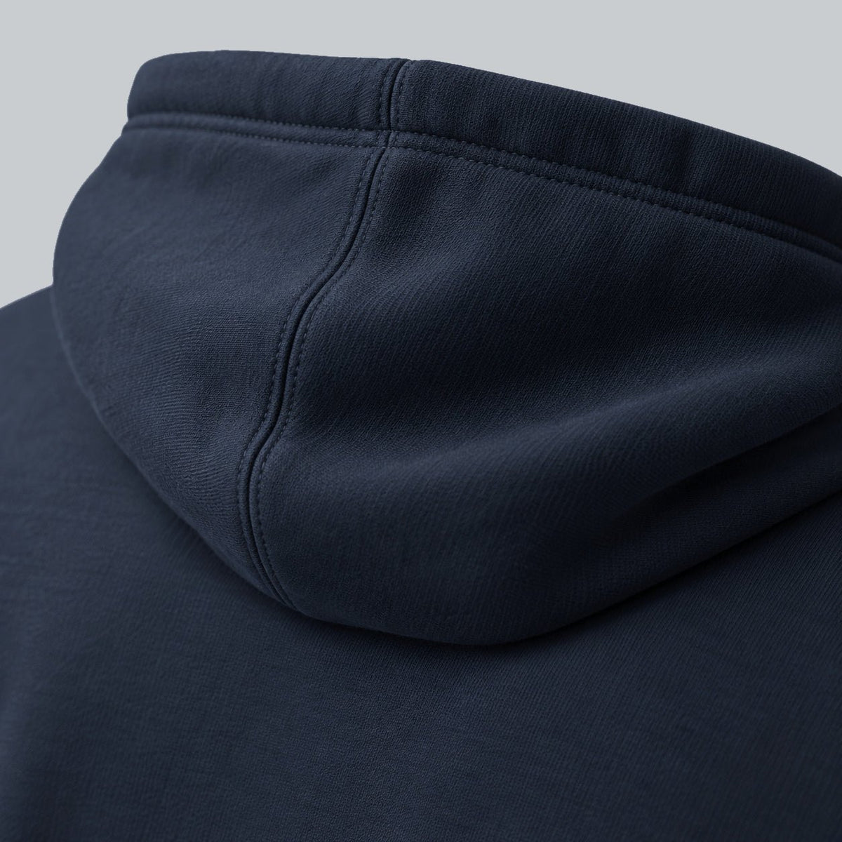 Premium Unisex Tech Tool Core Pullover Hoodie, back construction macro showing hood seam and cotton-blend fabric | Color: Navy Blazer