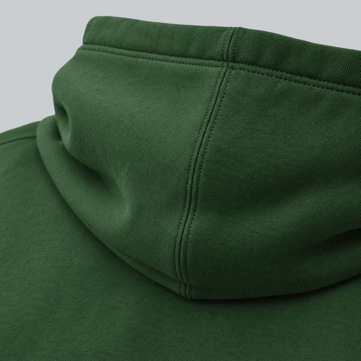 Premium Unisex Tech Tool Core Pullover Hoodie, back construction macro showing hood seam and cotton-blend fabric | Color: Forest Green