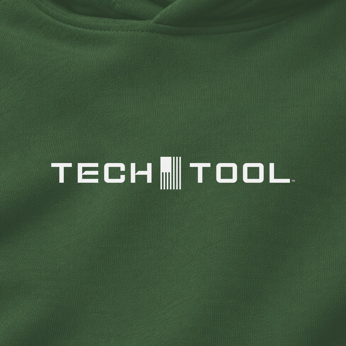 Premium Unisex Tech Tool Core Pullover Hoodie, centered chest-print close-up showing Tech Tool logo and cotton-blend fabric | Color: Forest Green