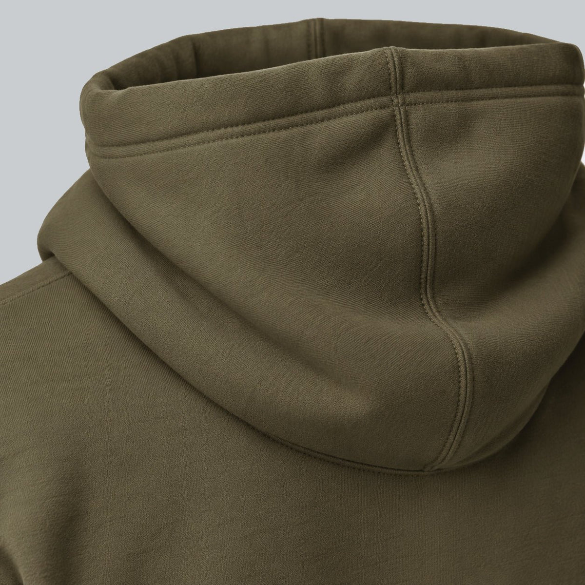 Premium Unisex Tech Tool Core Pullover Hoodie, back construction macro showing hood seam and cotton-blend fabric | Color: Military Green