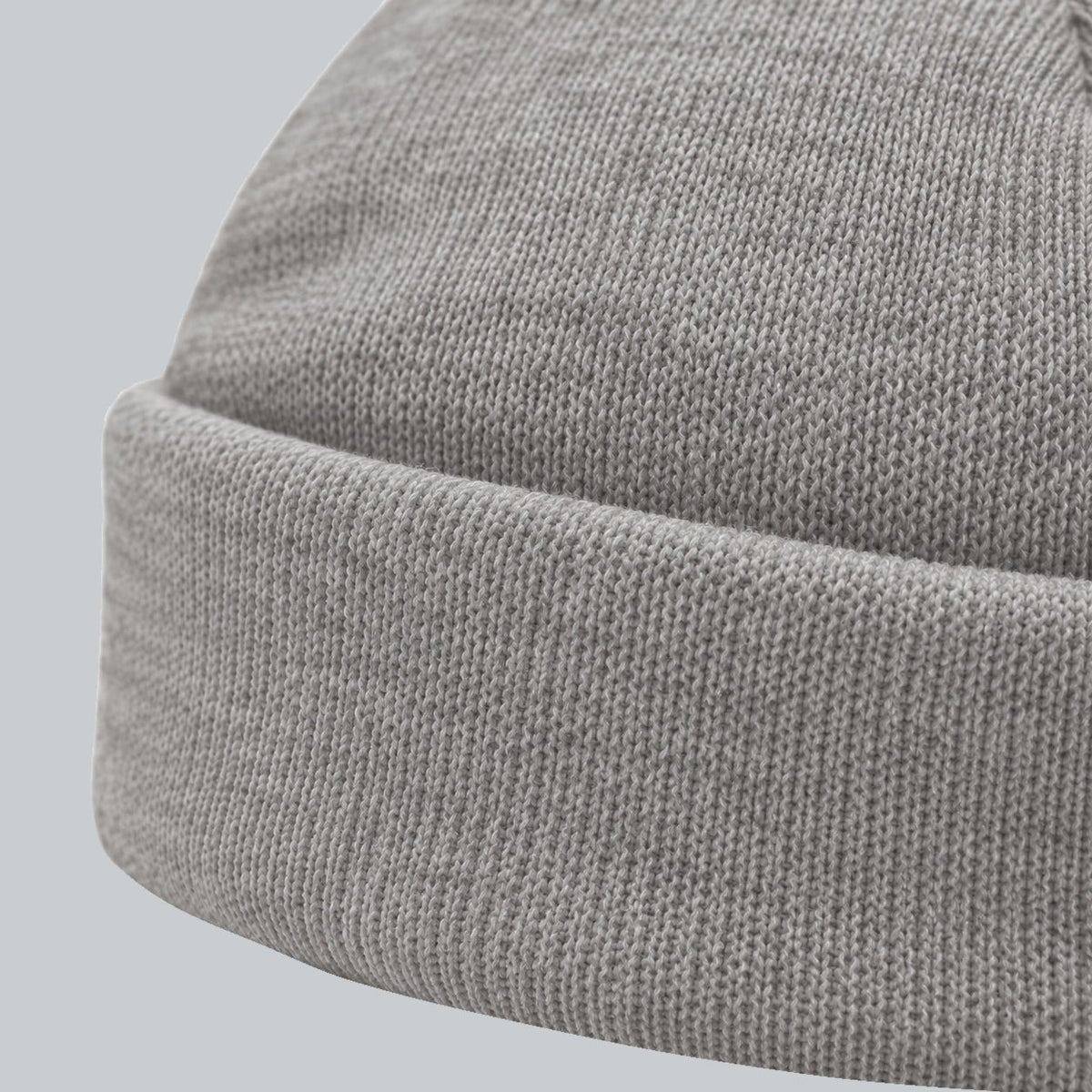 Tech Tool Core Cuffed Beanie, oblique macro of folded cuff thickness and fine acrylic knit | Color: Heather Grey