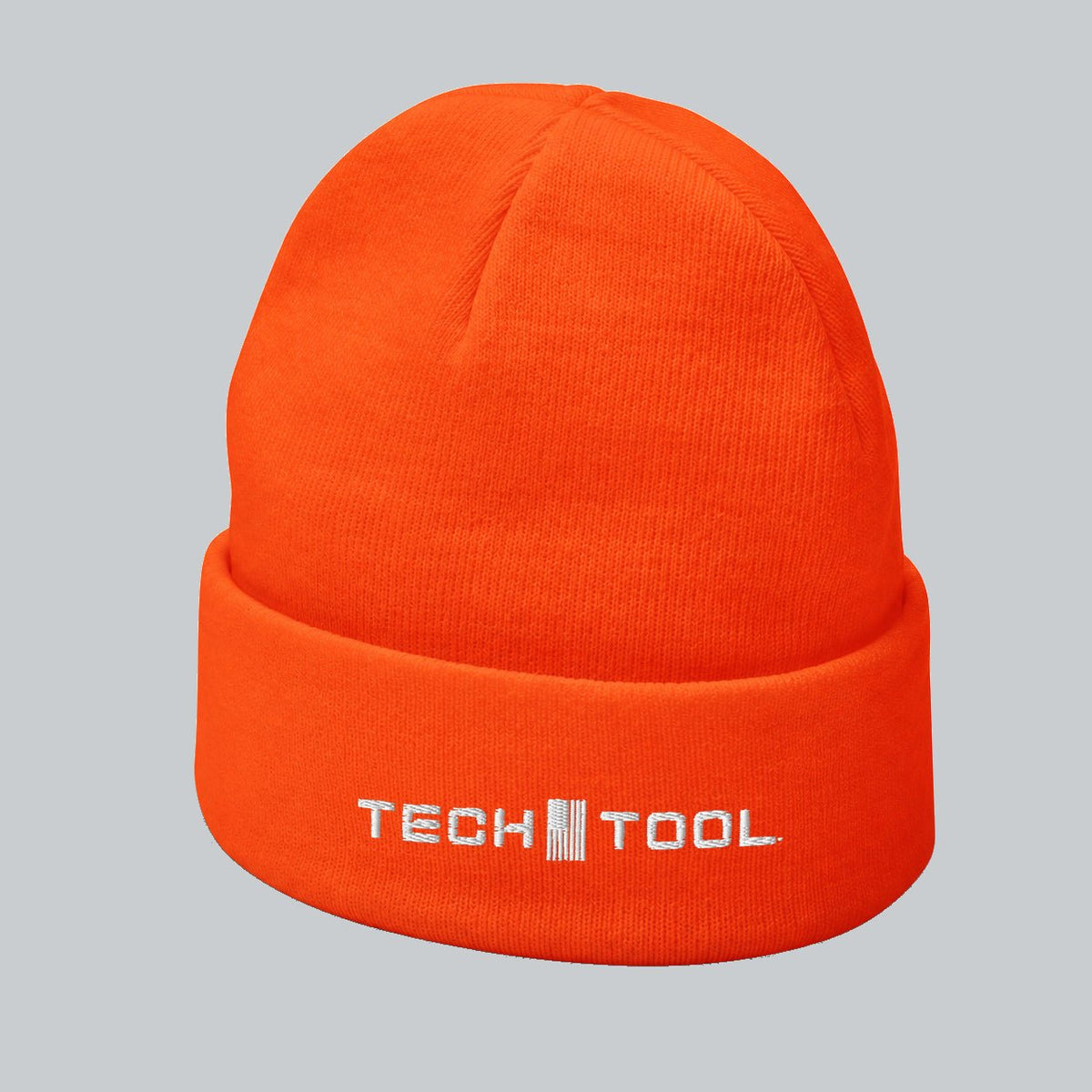 Neon Cuffed Beanie, angled cuff view showing white Tech Tool embroidery and fine knit | Color: Neon Orange
