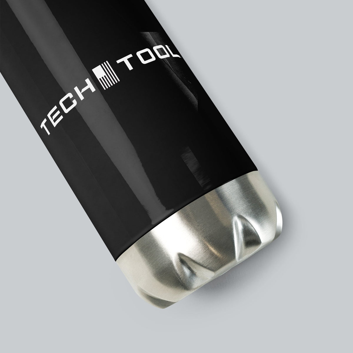 Stainless Steel Water Bottle, angled close-up of Tech Tool print and brushed stainless steel base | Color: Black