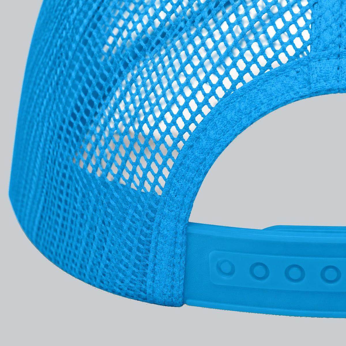 Never a Dull Moment Trucker Hat, oblique macro of mesh, bound back opening and adjustable snap attachment | Color: Bluebird (Blue / White)