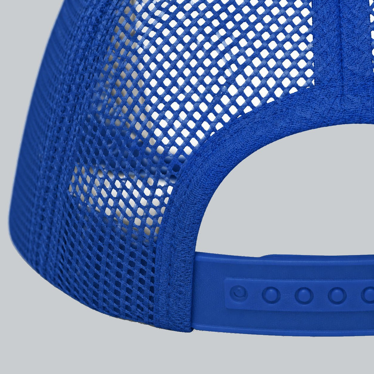 Never a Dull Moment Trucker Hat, oblique macro of mesh, bound back opening and adjustable snap attachment | Color: All-American (Red / White / Royal)