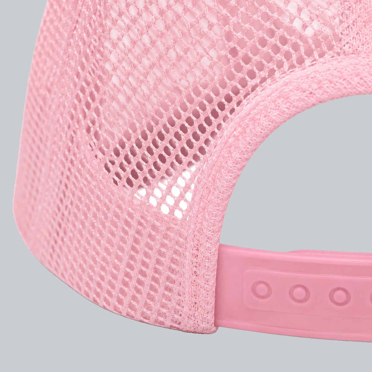 Never a Dull Moment Trucker Hat, oblique macro of mesh, bound back opening and adjustable snap attachment | Color: Barbie (Light Pink / White)