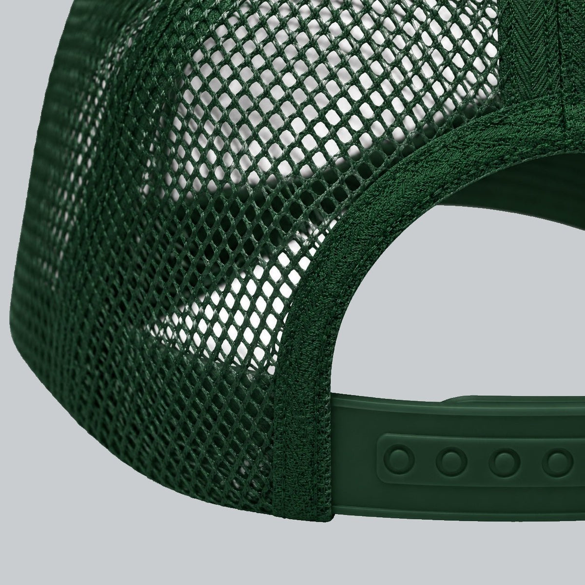 Never a Dull Moment Trucker Hat, oblique macro of mesh, bound back opening and adjustable snap attachment | Color: Evergreen (Dark Green / White)