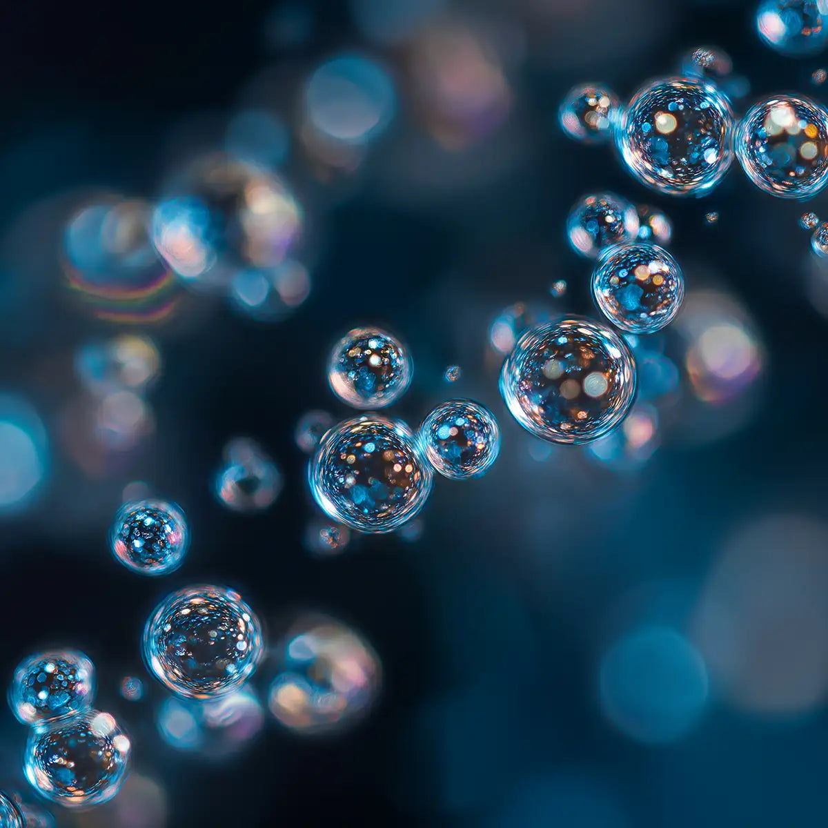 Oemeta HYCUT CF 21 power component oil shown as clear micro droplet clusters on a blue coolant surface used by Tech Tool for Hycut coolant systems all material safety and added biostability