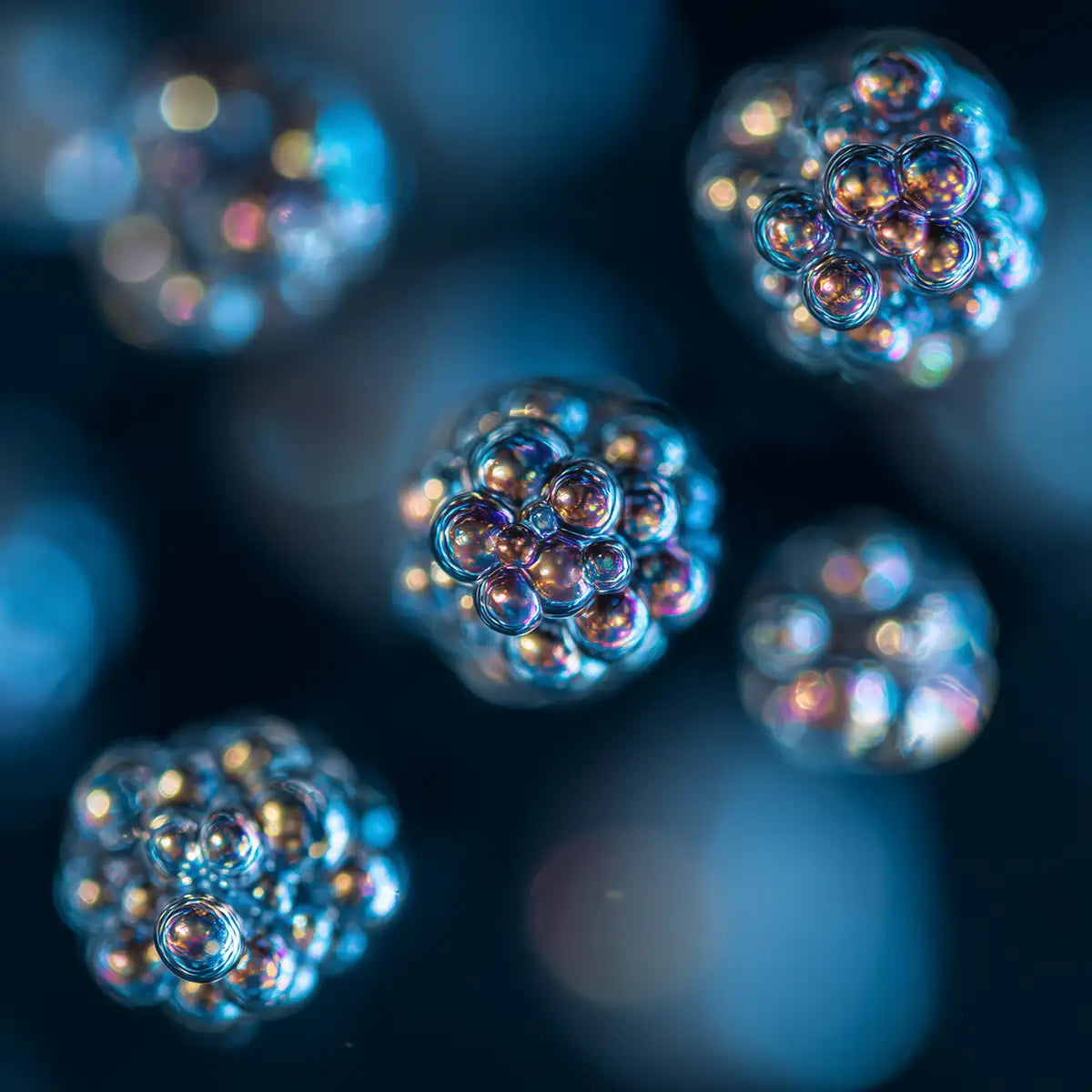 Oemeta HYCUT ET 46 power component oil shown as detailed micro droplet clusters on a blue coolant surface used by Tech Tool for Hycut coolant systems stable performance and all material safety