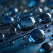 Oemeta HYTAP 12 tapping fluid shown on a blue coolant surface with clear micro droplet detail used by Tech Tool for small diameter holes blind holes and high lubricity tapping performance