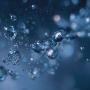 Slow motion micro droplet coolant field showing the smooth stable fluidity of Oemeta NOVAMET 875 during heavy duty machining