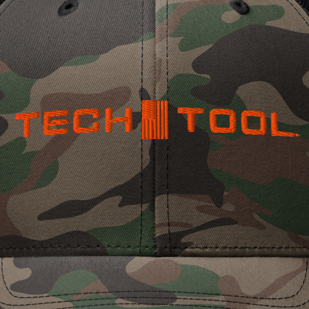 Tech Tool Unisex Camo Frame Cap, close-up of the full orange embroidered Tech Tool logo on camouflage fabric | Color: Camo/Black