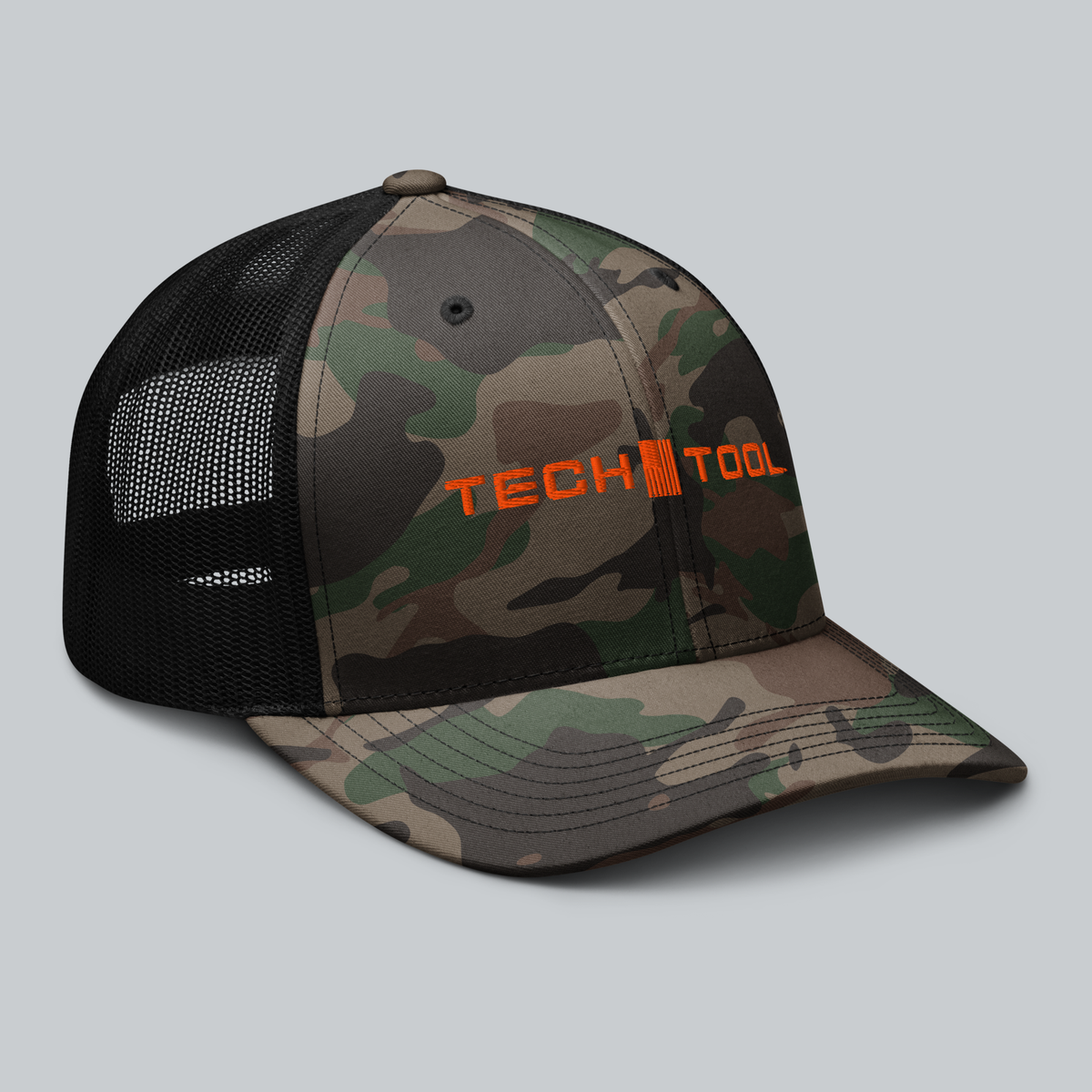 Tech Tool Unisex Camo Frame Cap, right three-quarter view showing orange embroidery, curved bill and black mesh | Color: Camo/Black