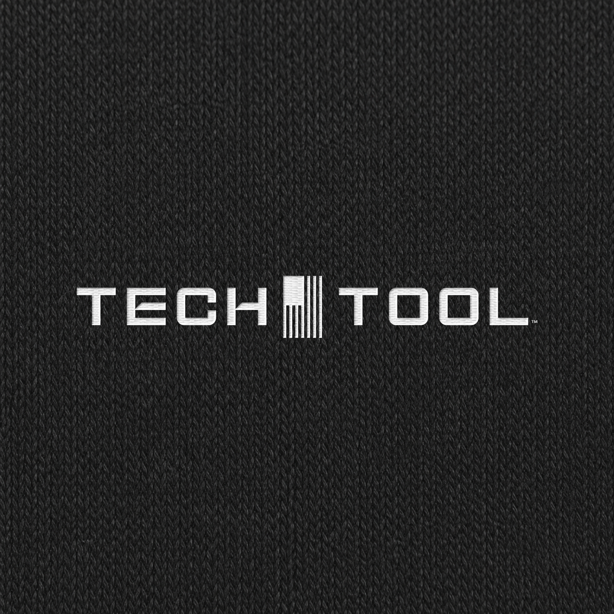 Tech Tool Unisex Core Fleece Joggers, macro detail render of Tech Tool embroidery and cotton-face fabric | Color: Black
