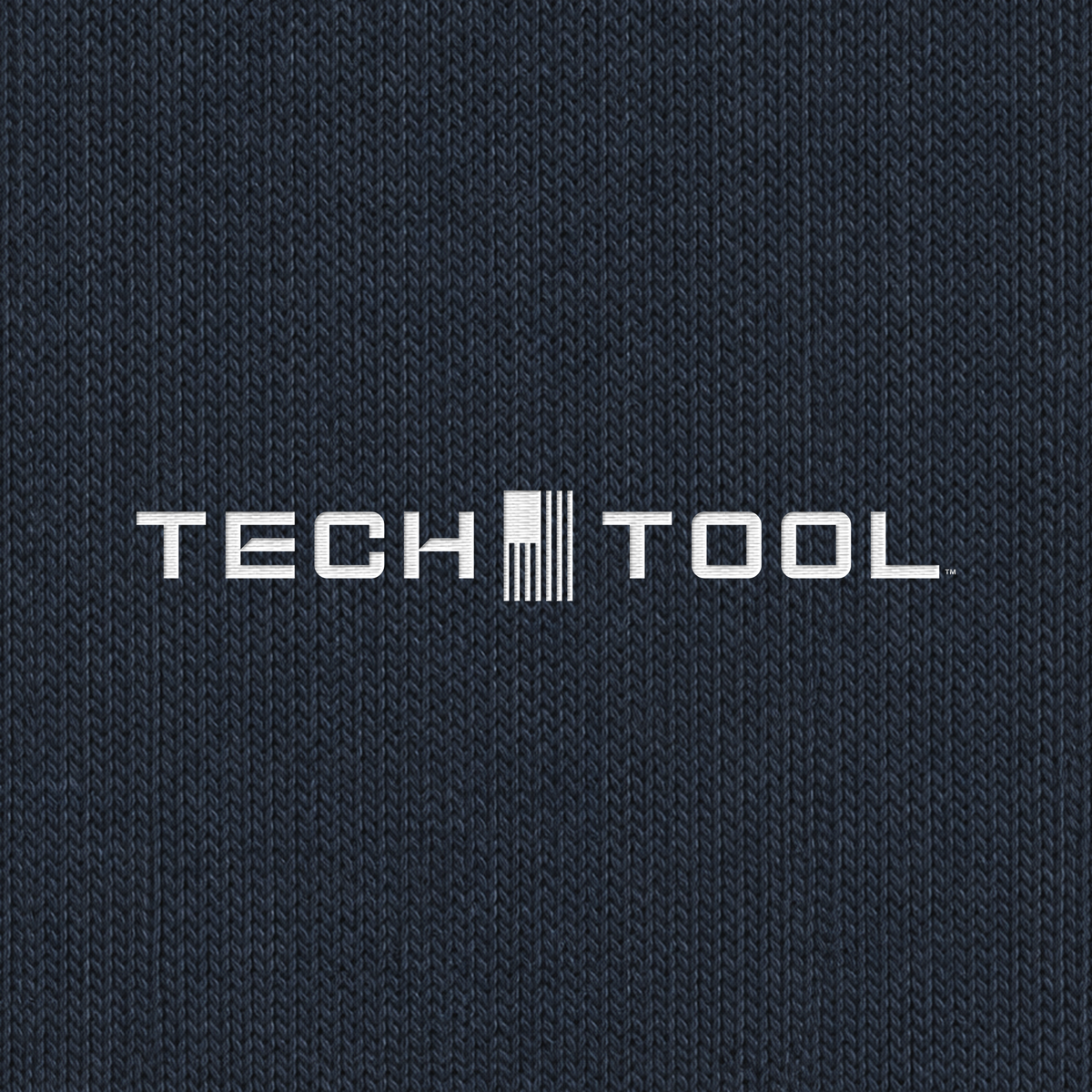 Tech Tool Unisex Core Fleece Joggers, macro detail render of Tech Tool embroidery and cotton-face fabric | Color: Navy Blazer