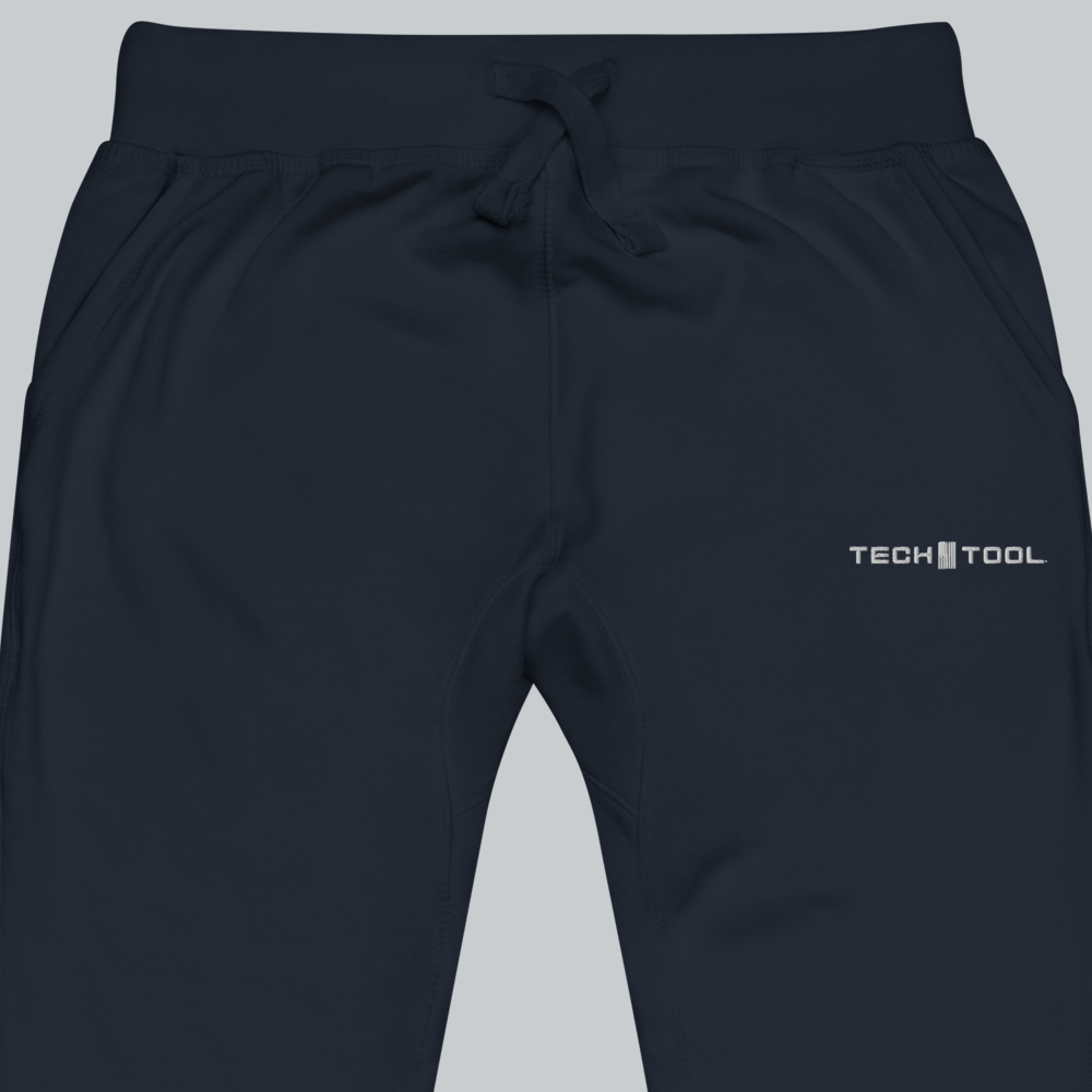 Tech Tool Unisex Core Fleece Joggers, waist and upper-thigh detail showing drawcord, pocket openings and full Tech Tool embroidery | Color: Navy Blazer