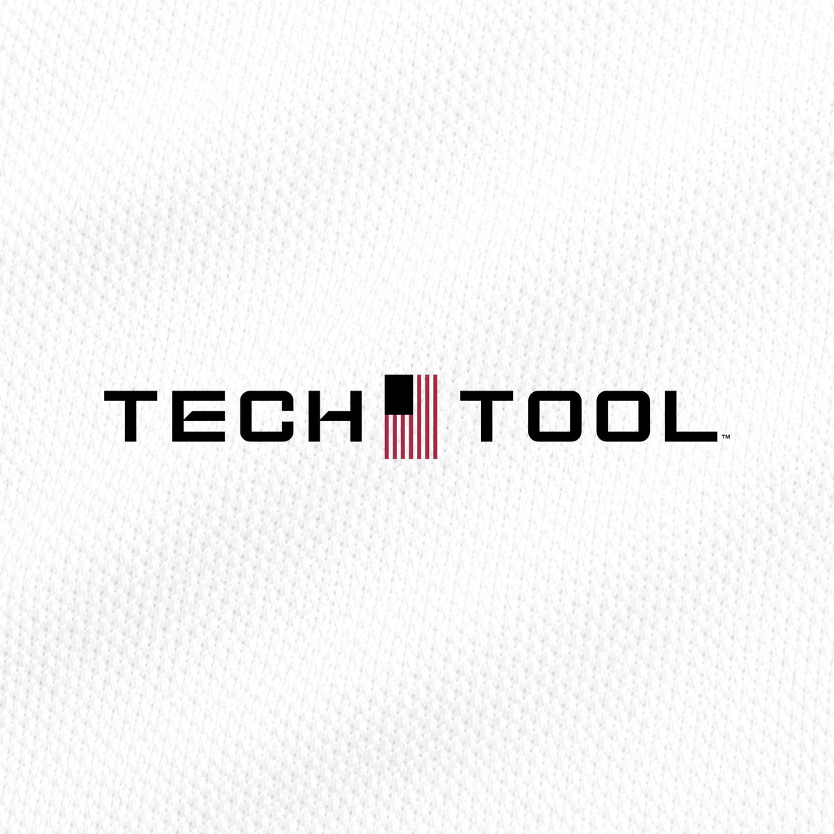 Tech Tool Unisex Core Quarter-Zip Pullover, macro detail render of the Tech Tool logo and smooth polyester interlock | Color: White