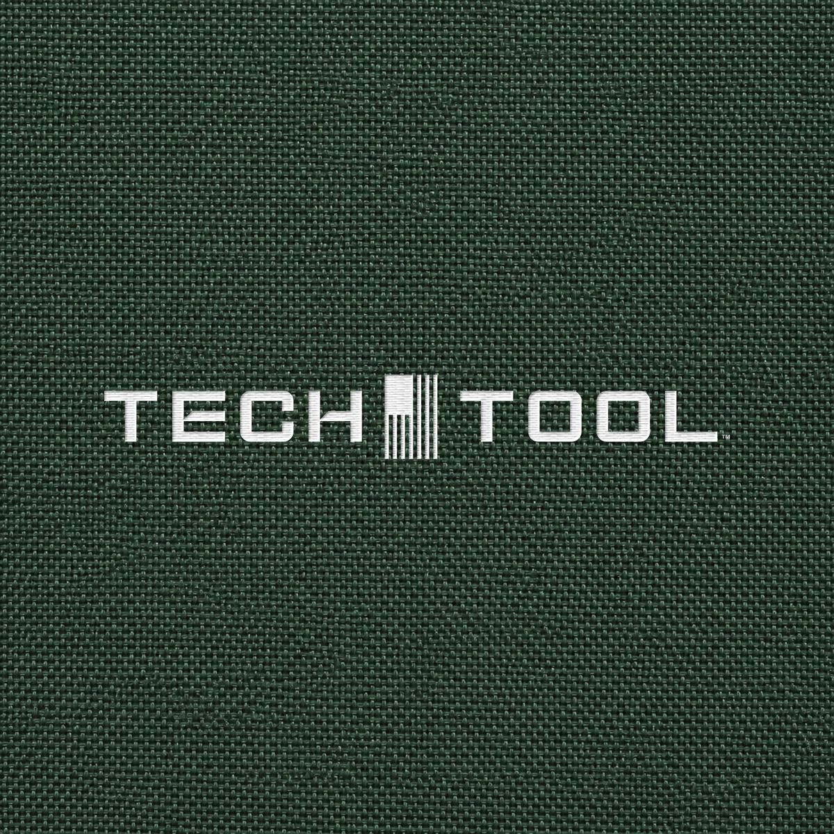 Tech Tool Unisex Core Windbreaker, detailed render of the full Tech Tool embroidery on matching polyamide shell fabric | Color: Forest Green