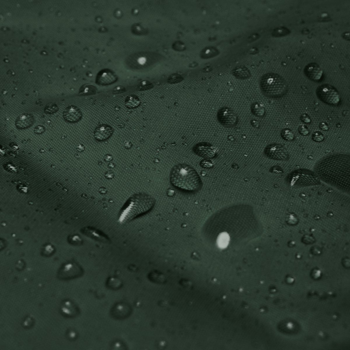 Tech Tool Unisex Core Windbreaker, supplier close-up of the polyamide shell fabric with water droplets | Color: Forest Green
