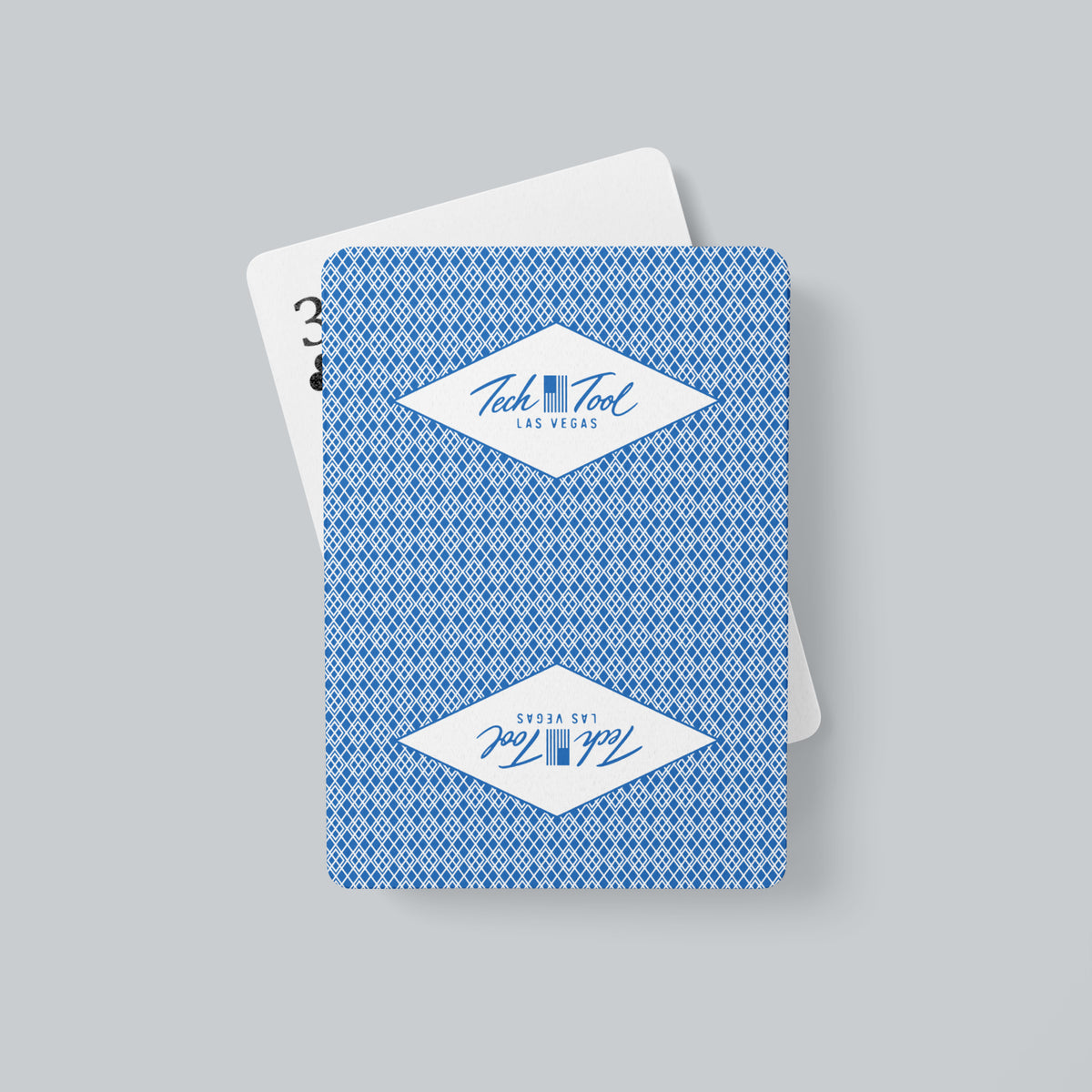 Tech Tool Las Vegas playing cards in blue, printed back alongside a face-up card | Color: Vegas Blue