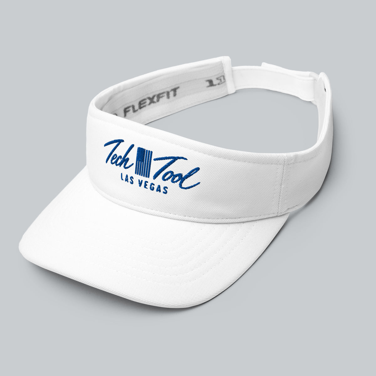 Tech Tool Las Vegas visor in white with blue logo, three-quarter front view | Color: Vegas Blue (White / Blue Logo)