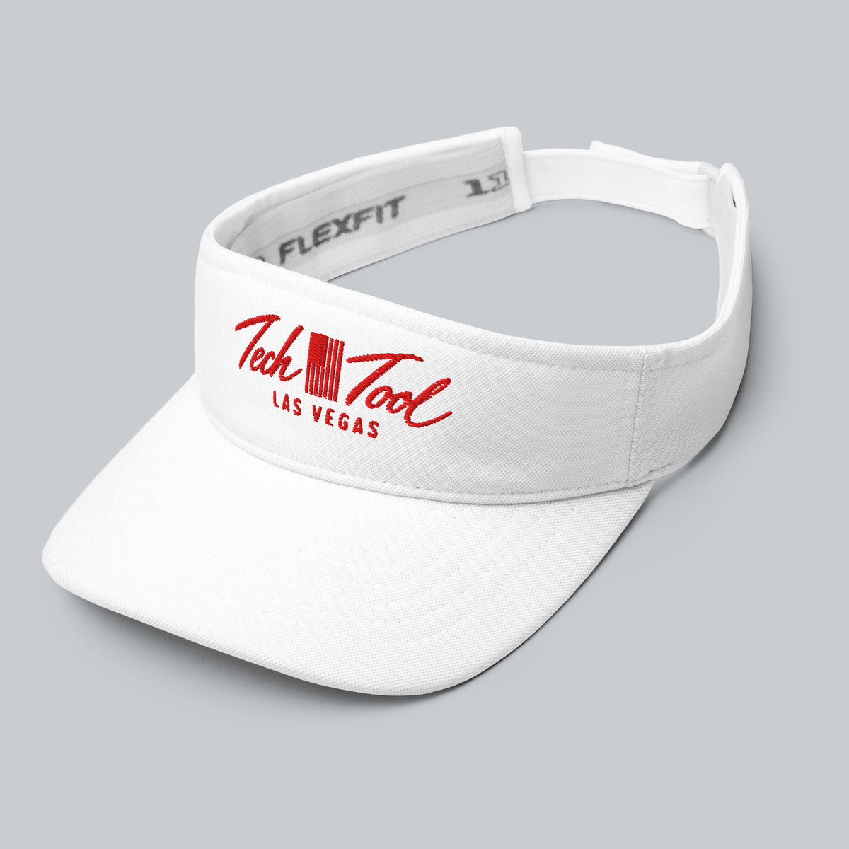 Tech Tool Las Vegas visor in white with red logo, three-quarter front view | Color: Vegas Red (White / Red Logo)