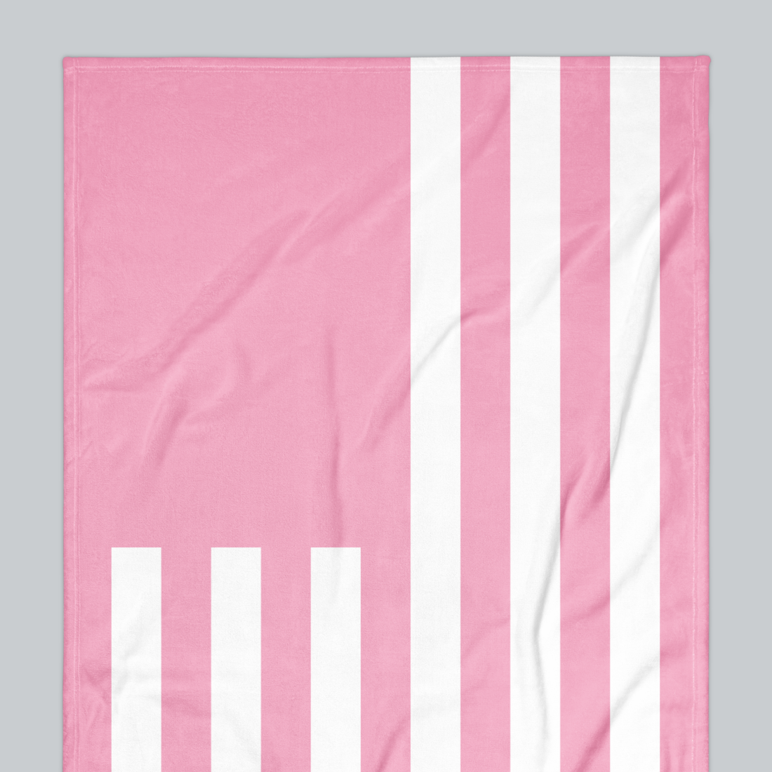 Tech Tool Signature Beach Towel in Barbie Pink, upper-left flag and stripe detail | Color: Barbie Pink