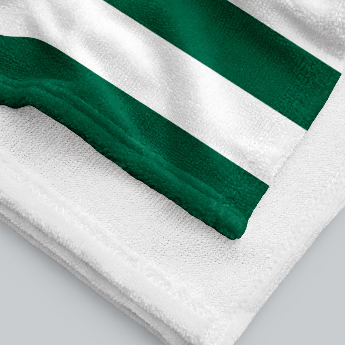 Tech Tool Signature Beach Towel in Golf Green, folded printed face and white terry reverse | Color: Golf Green