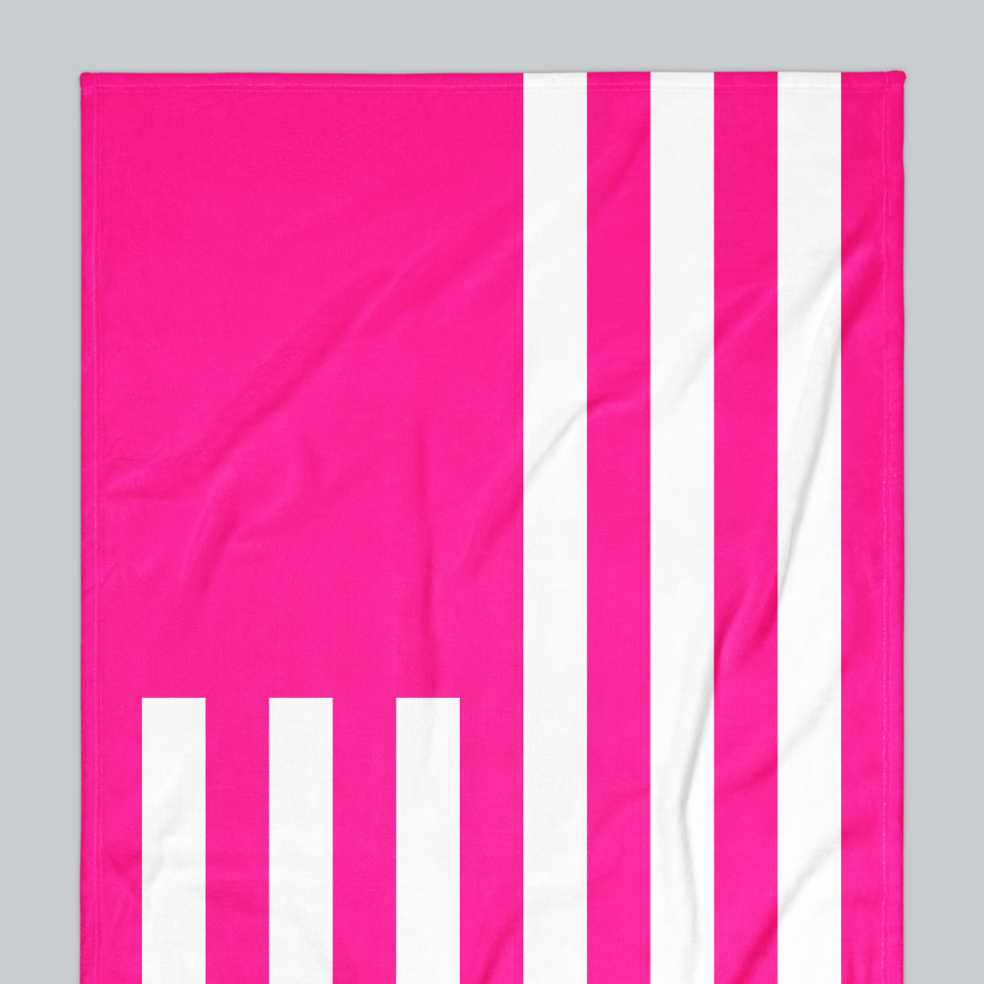 Tech Tool Signature Beach Towel in Hot Pink, upper-left flag and stripe detail | Color: Hot Pink