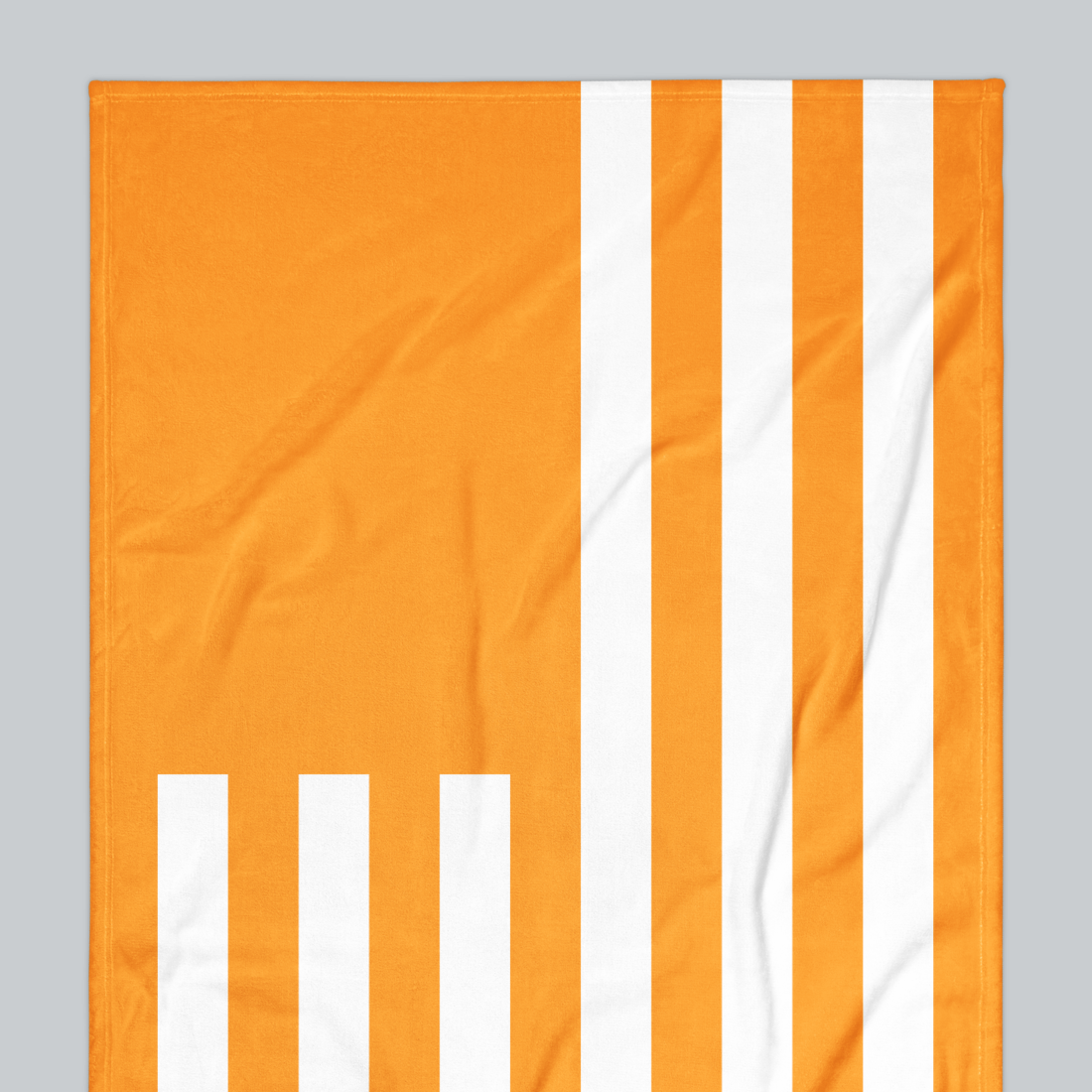 Tech Tool Signature Beach Towel in Mango Orange, upper-left flag and stripe detail | Color: Mango Orange