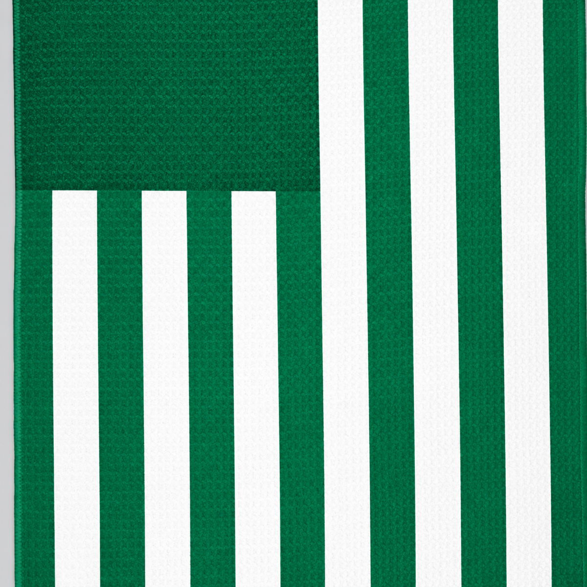 Tech Tool Signature Golf Towel in Golf Green, close view of flag stripes and hem | Color: Golf Green