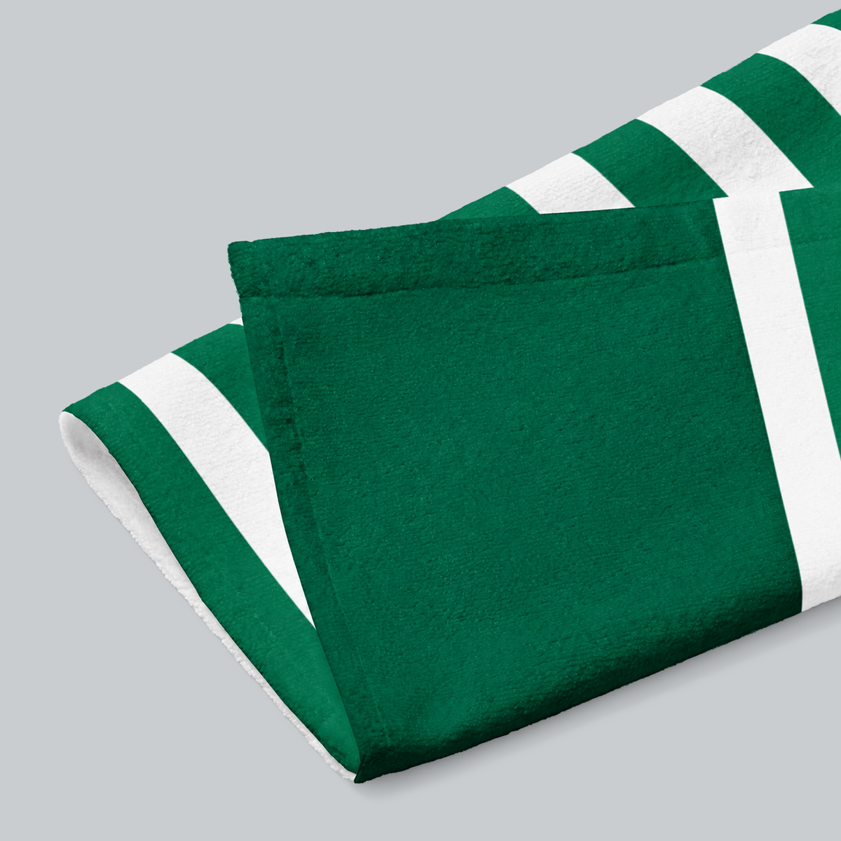 Tech Tool Signature Hand Towel in Golf Green, folded print and hem detail with white reverse | Color: Golf Green