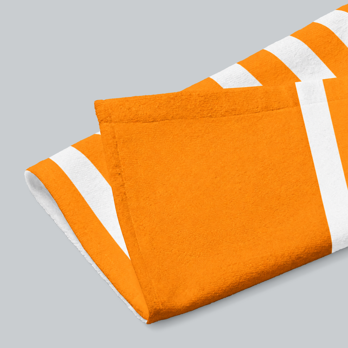 Tech Tool Signature Hand Towel in Mango Orange, folded print and hem detail with white reverse | Color: Mango Orange