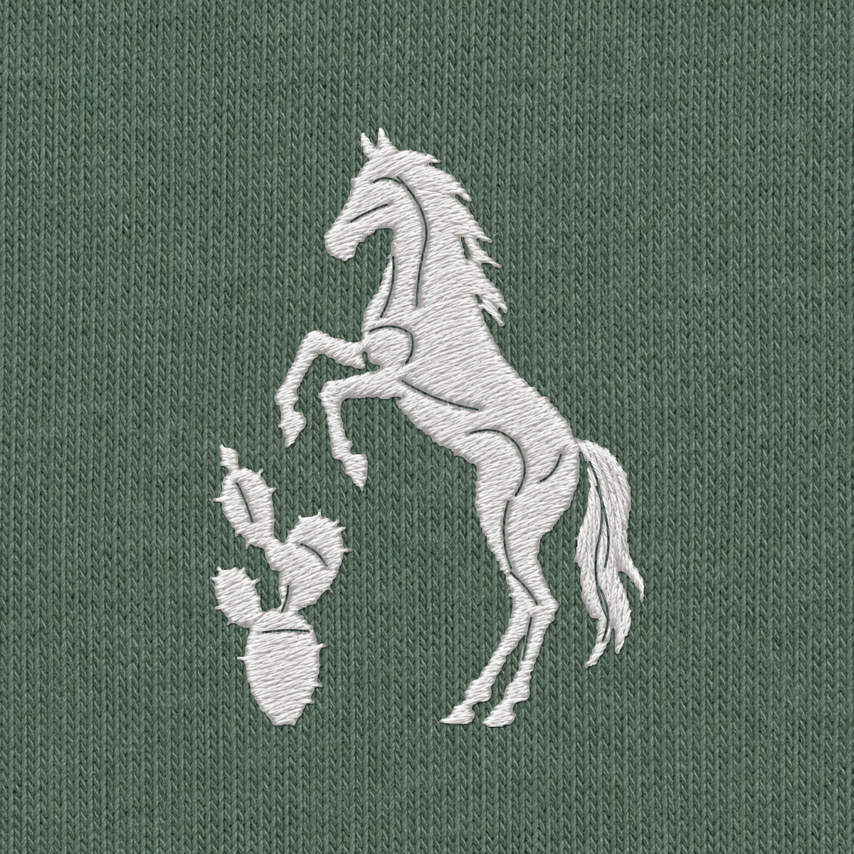 Tech Tool Texas embroidered tee in Spruce, embroidery detail render of the white horse-and-cactus emblem on cotton jersey | Color: Spruce
