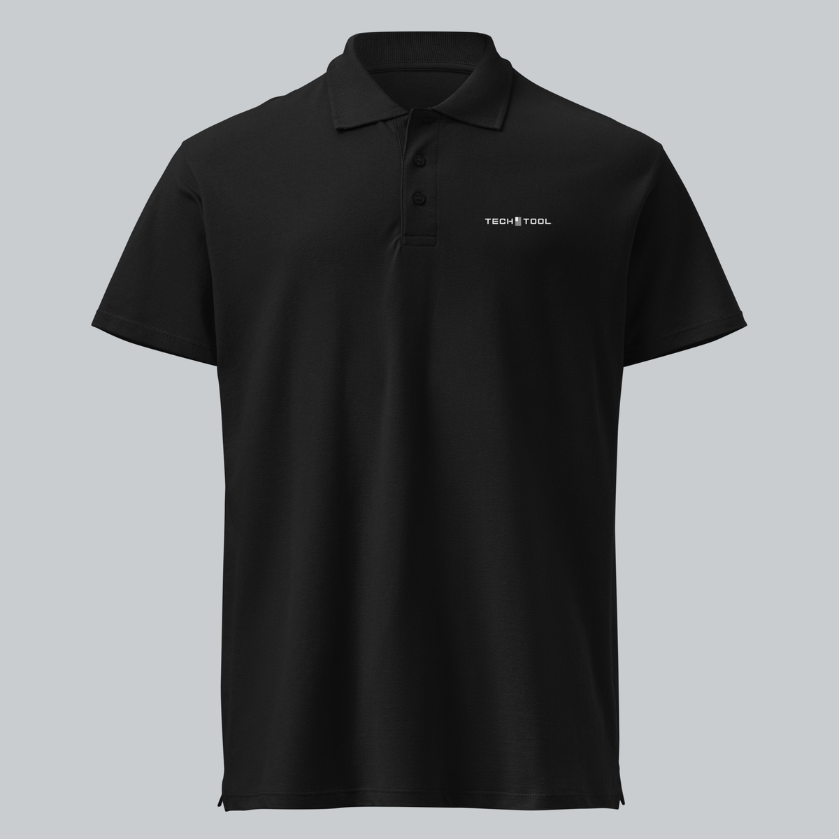 Tech Tool Unisex Core Piqué Polo, front view showing the Tech Tool left-chest logo, ribbed collar and three-button placket | Color: Black